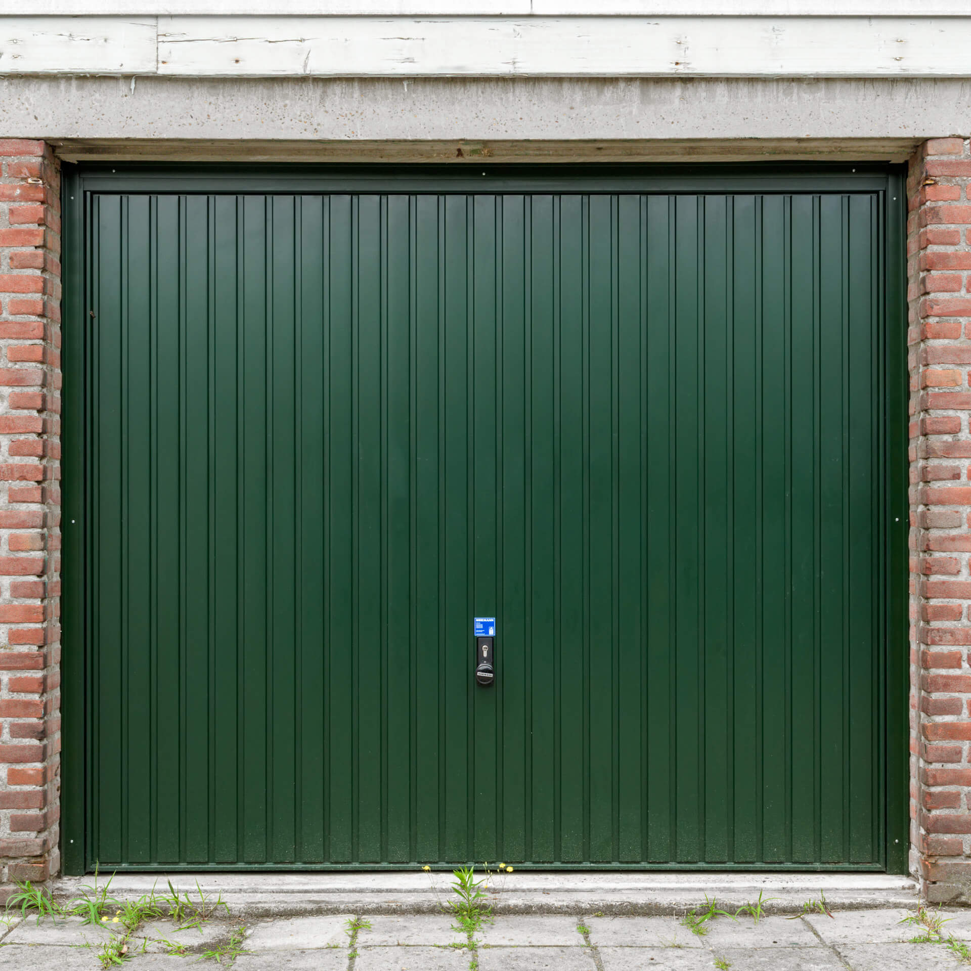 slot garagepoort vervangen